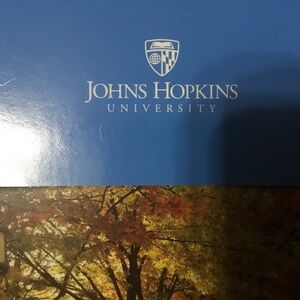 John Hopkins University 10 Picture Cards with facts and wristband with logo.